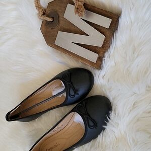 Crepuscolo Black flats with bow accent and a slight sheen NIB